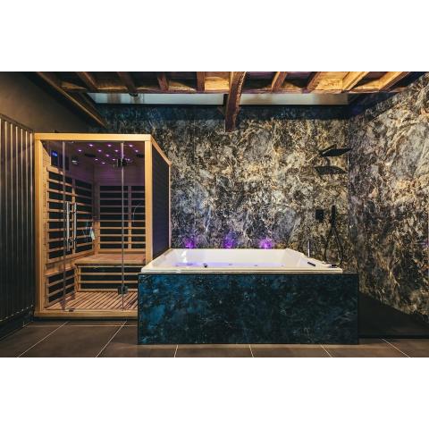 Le Duplex de l'Etoile home cinéma jacuzzi et sauna privatif