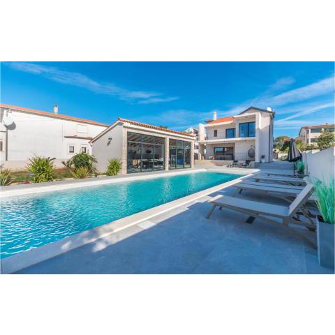 Nice home in Biograd na Moru with Outdoor swimming pool, WiFi and 5 Bedrooms