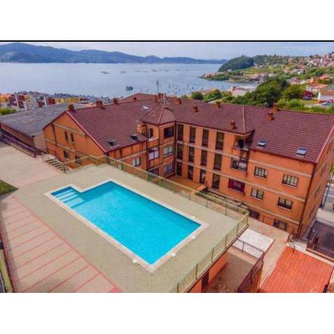 Raxó con piscina en la urbanización